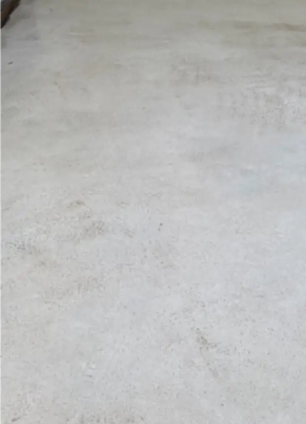 The same concrete washed to an even pale grey